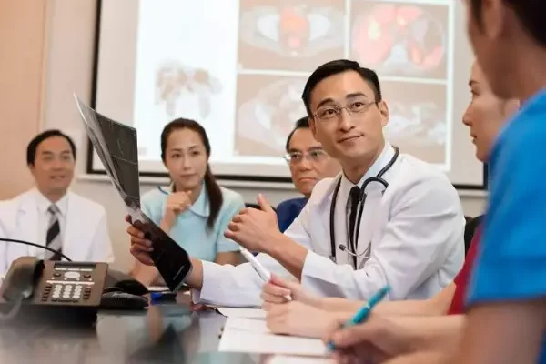 Hope4Cancer doctor hugging a patient at the Tijuana clinic